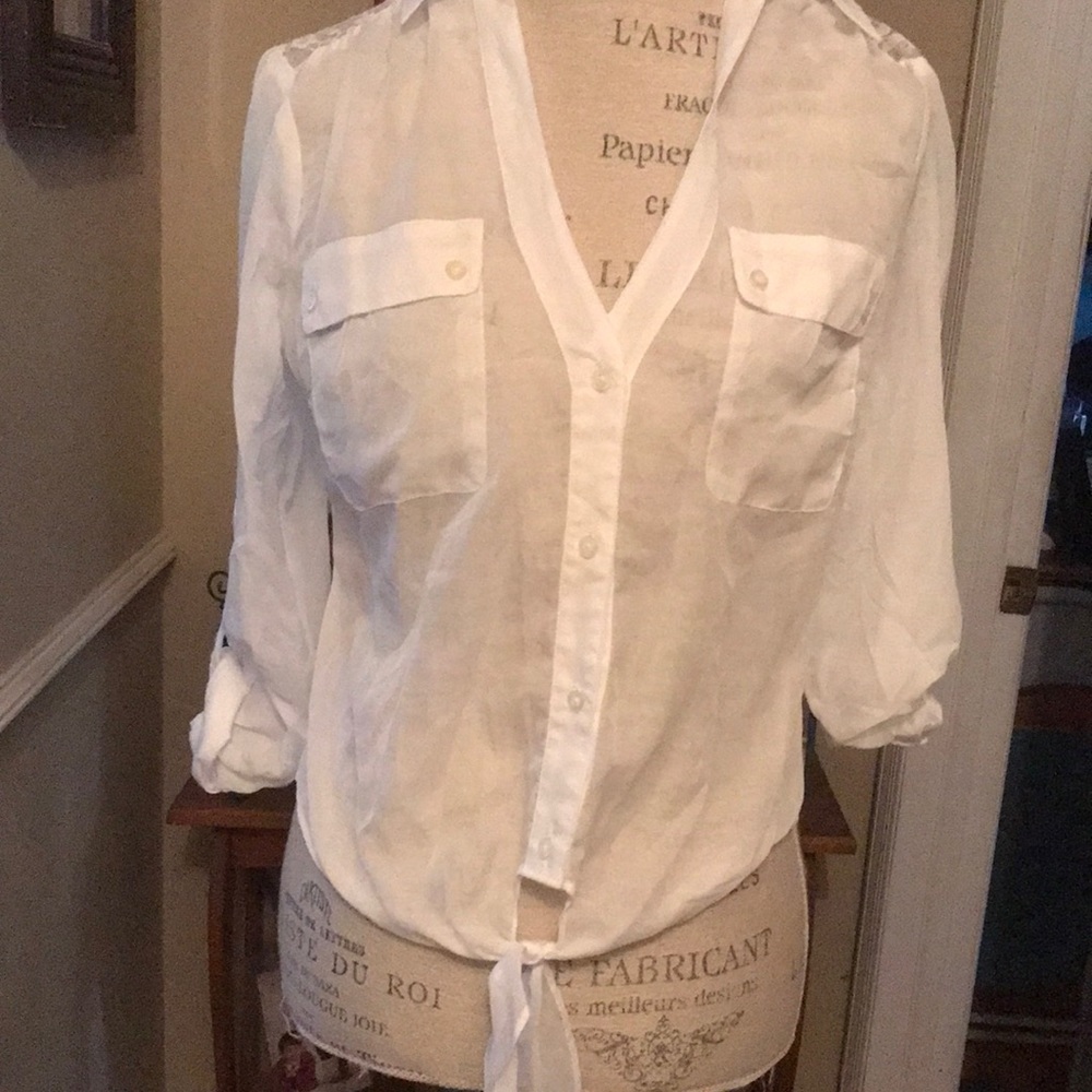 Candie’s medium woman’s white sheer long sleeve blouse that ties in the front